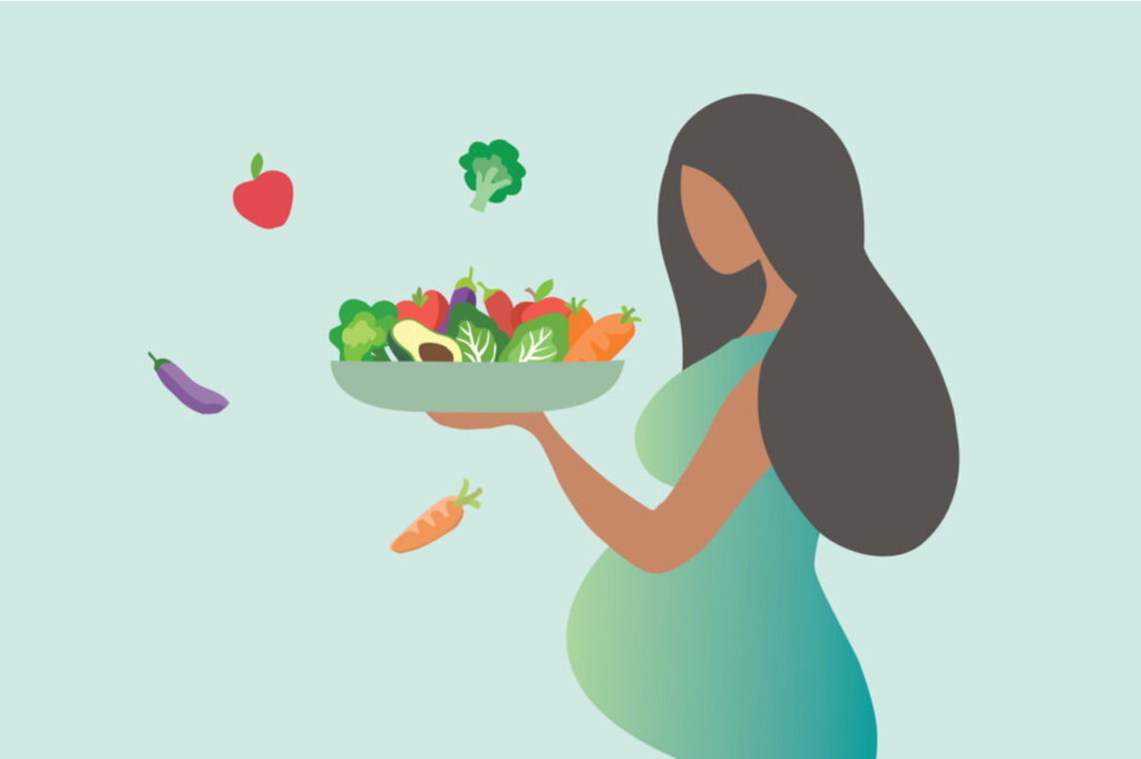Illustration d'une femme enceinte qui tient un bol de légumes et de crudités